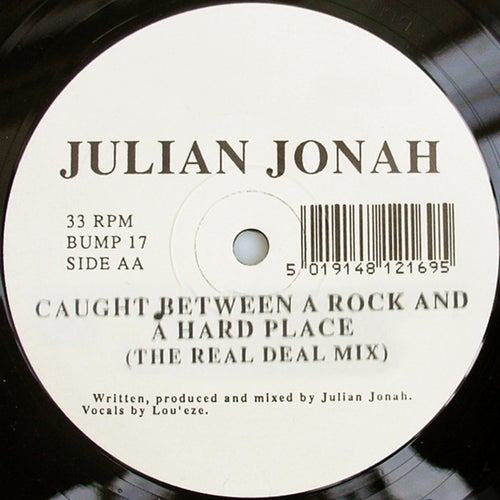 Caught Between A Rock And A Hard Place