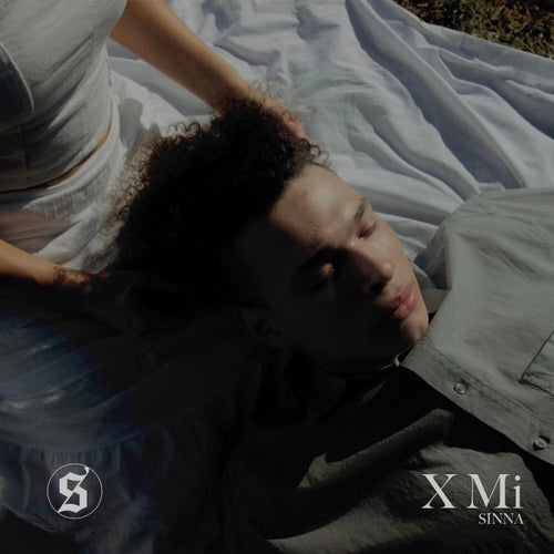X Mi