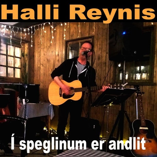 Í speglinum er andlit